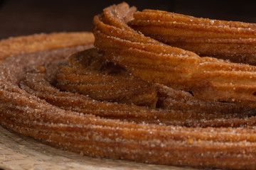 Churros fritos en manteca