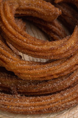 Churros fritos en manteca