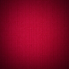 Red fabric background.
