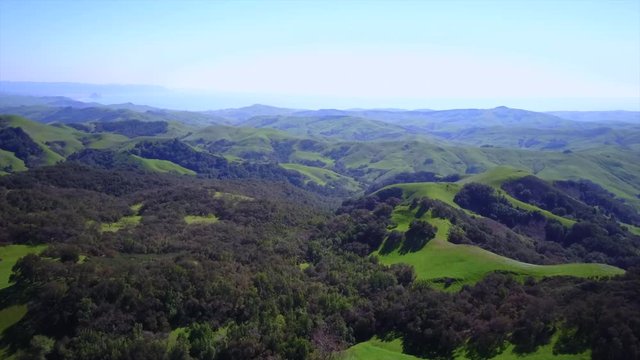 Aerial shot of the green mountains of Cambria San Simeon California USA