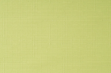 Lime green fabric background.
