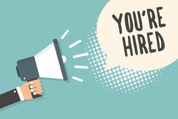 Handwriting text You re are Hired. Concept meaning New Job Employed Newbie Enlisted Accepted Recruited Man holding megaphone loudspeaker speech bubble blue background halftone