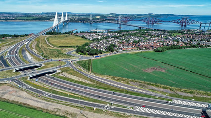 Aerial image of traffic on the approach roads to the Queensferry Crossing bridge near Edinburgh.