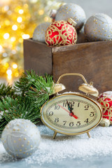 Fototapeta na wymiar Christmas card with clock and Christmas decor.