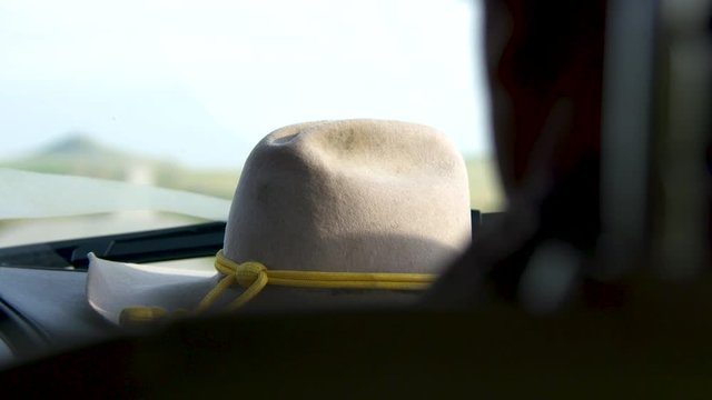 a cowboy hat in high speed/slow motion