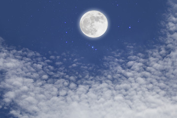 Romantic night. Full moon  over cloudscape background.