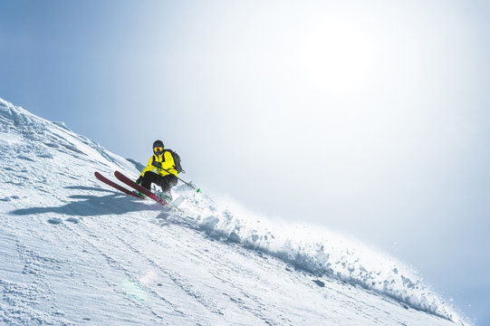 The Total Length Of Skiing On Fresh Snow Powder. Professional Skier Outside The Track On A Sunny Day