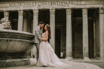 Young wedding couple by Pantheon in Rome, Italy