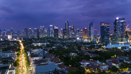 Obraz premium Glowing Jakarta cityscape at night time