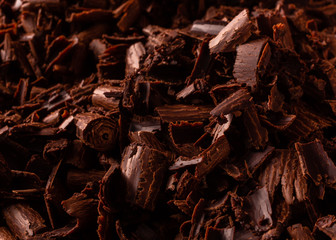 Chocolate shavings decor. Background food in a low key.