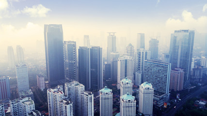 Fototapeta na wymiar Skyscrapers with air pollution in Jakarta