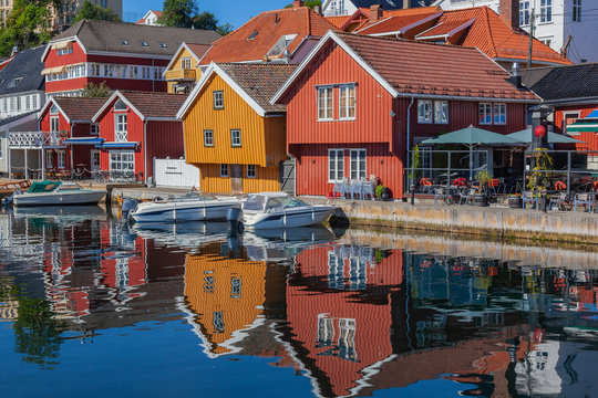 Colorful clapboard houses on the waterfront of Kragero, Southern Norway