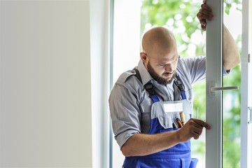 Young man in uniform at work