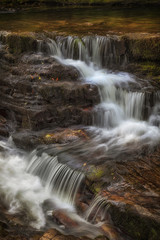 A section of the waterfall known as Sgwd y Pannwr in Waterfall Country, South Wales, UK
 - obrazy, fototapety, plakaty