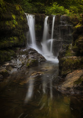 The gully at Sgwd y Pannwr, a popular spot for a rest and picnic for the trekkers who visit Waterfall Country in South Wales, UK
