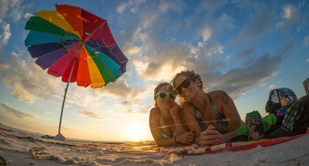 LOVERS KEY, FORT MYERS BEACH, FLOIRDA/USA 11/4/15: Girlfriends enjoying the sunset on the beach...