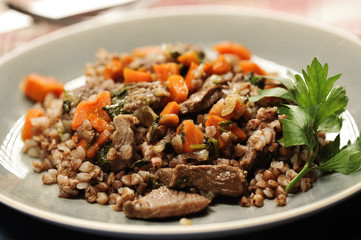 buckwheat porridge with stewed meat and carrots