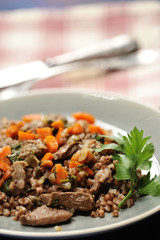 buckwheat porridge with stewed meat and carrots