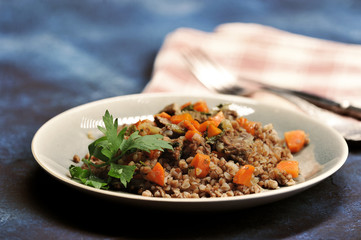 buckwheat porridge with stewed meat and carrots