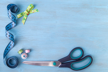 still life of spools of thread on a wooden background