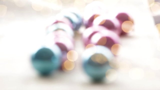 Christmas deoration balls baubles and bokeh lights background