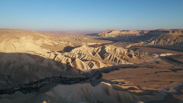 Aerial footage at Sde Boker, in Neguev desert of Israel. Dry river in the desert landscape.