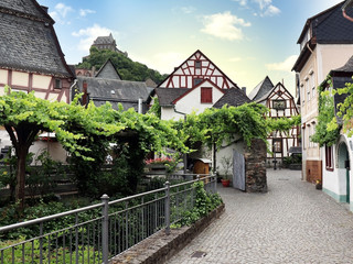 Fototapeta na wymiar Cute town in Germany. Bacharach by the Rhein. Lot of wine cultures around and inside the village.