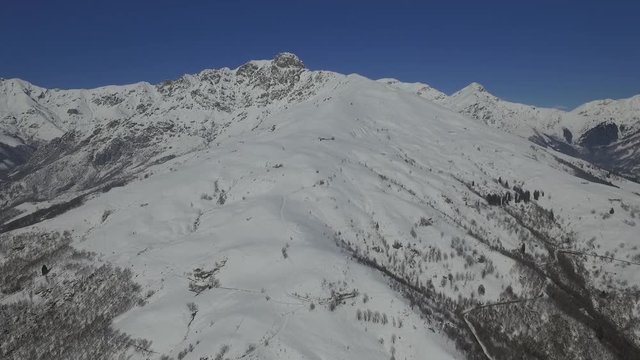 Italian snowy mountain with skiers
Alps