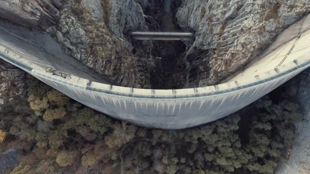 Drone Aerial Top View of the Vajont Dam in Italy, Slow Motion Top View of the Forest Valley with Rocks and Waterfalls