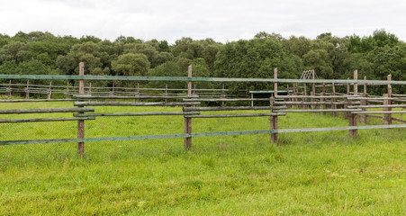 fence of wooden poles