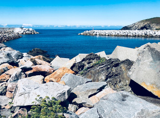 View of the seaport and lighthouses in Puerto de Vega, Asturias - Spain