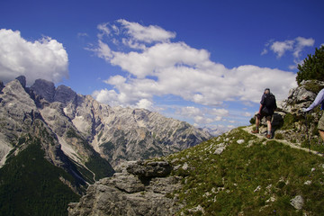 Hikers on steep trail up Monte piana