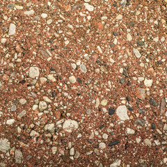Home construction planning and design for earth tone walls and floors using natural stone and rock for building materials.