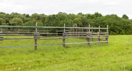 fence of wooden poles