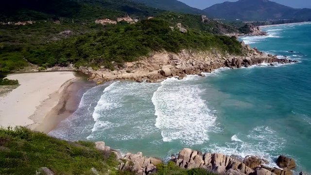 pictorial indented seacoast washed by ocean waves