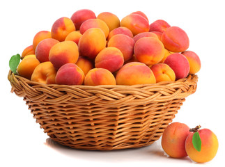 Apricots in a basket isolated on white