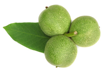 Green walnuts isolated on white, top view.