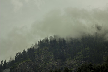 Fototapeta na wymiar heavy cloud in the rocks mountains