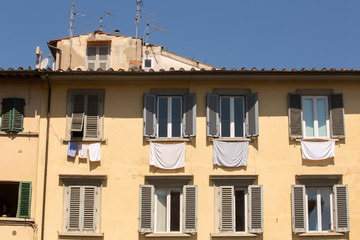 Apartment building with shuttered windows