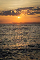 Obraz premium Beautiful sunset over the sea