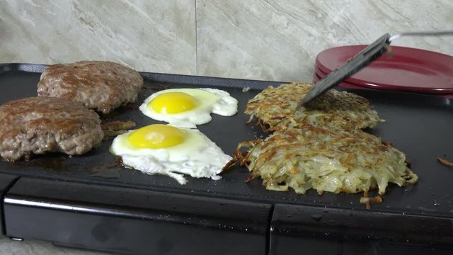 Cooking breakfast on an electric grill
