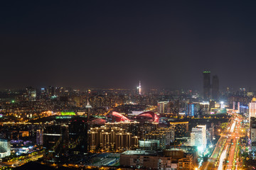 Fototapeta na wymiar Night view of modern cityscape in Nanjing, China