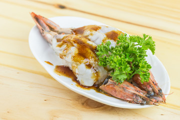 fresh grilled shrimps served on a plate