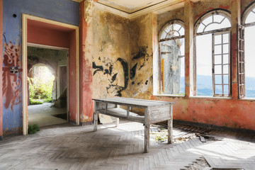 Fototapeta na wymiar Spooky interior of abandoned ruined house