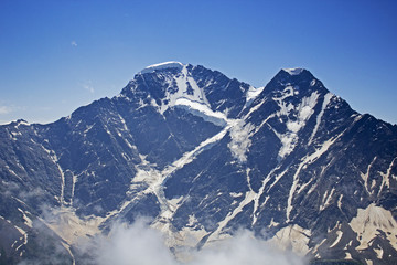 Fototapeta na wymiar Glacier Seven and beautiful view on mountains in valley near Elbrus