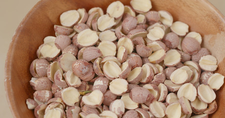 Dried lotus seed in wooden bowl