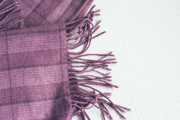 Lilac squared scarf on a white background © Elena