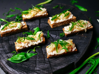 Vegetarian Bruschette with green decoration
