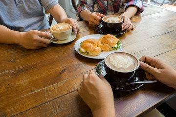 Latte coffee art and people meeting friendship togetherness coffee shop concept