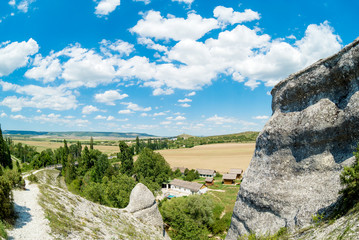 mountains on blue sky background with clouds on Sunny day